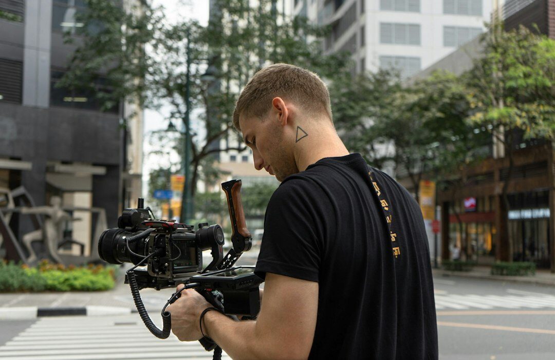 Camera operator filming live television broadcast